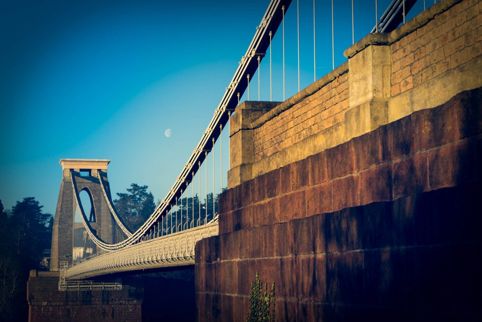 Moon and Bridge, Clifton Suspension Bridge, Bristol. England. Photograph by Ivo Dukić.