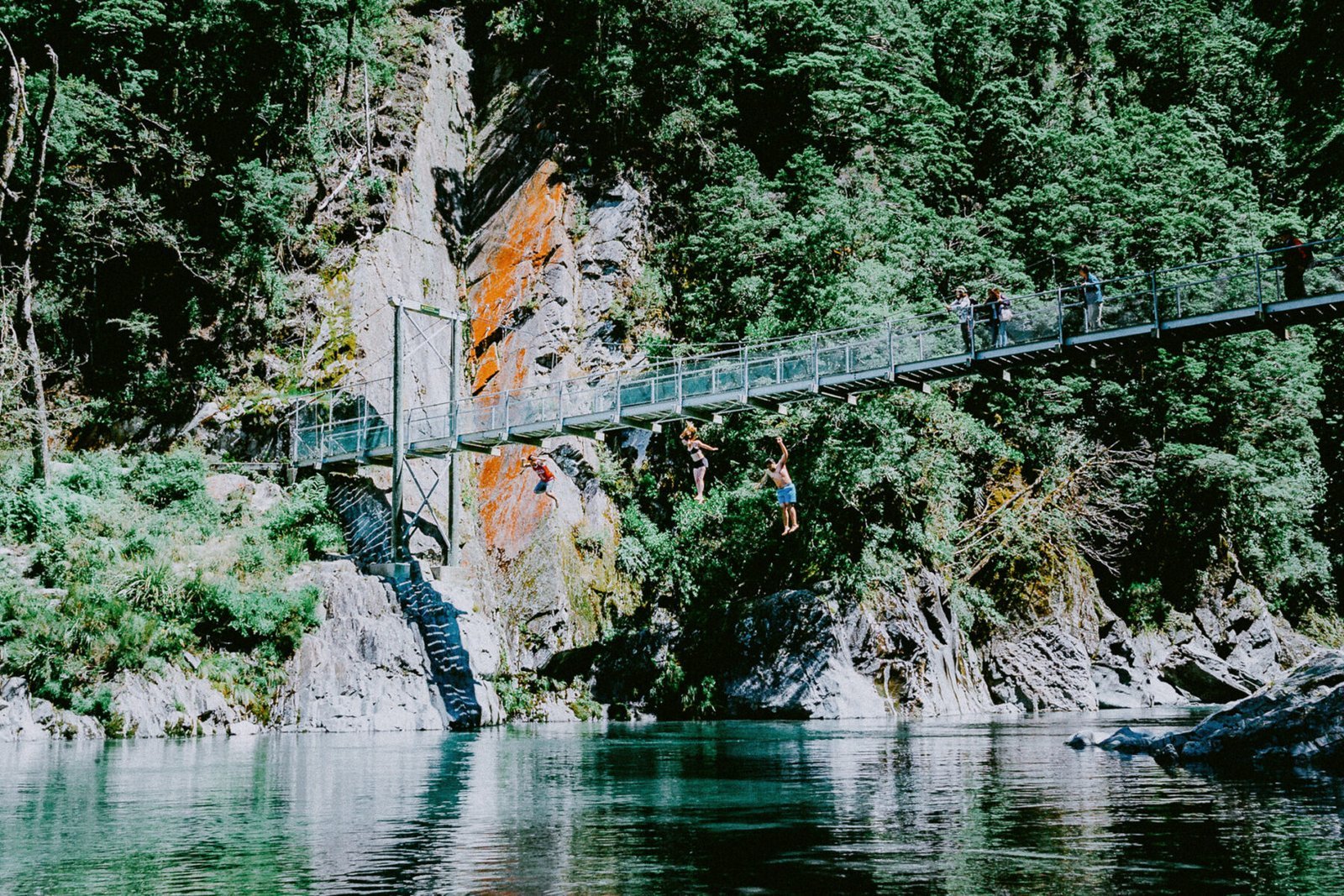 Bridge jumping, Blue Pools Track. New Zealand. Photograph by Ivo Dukić.